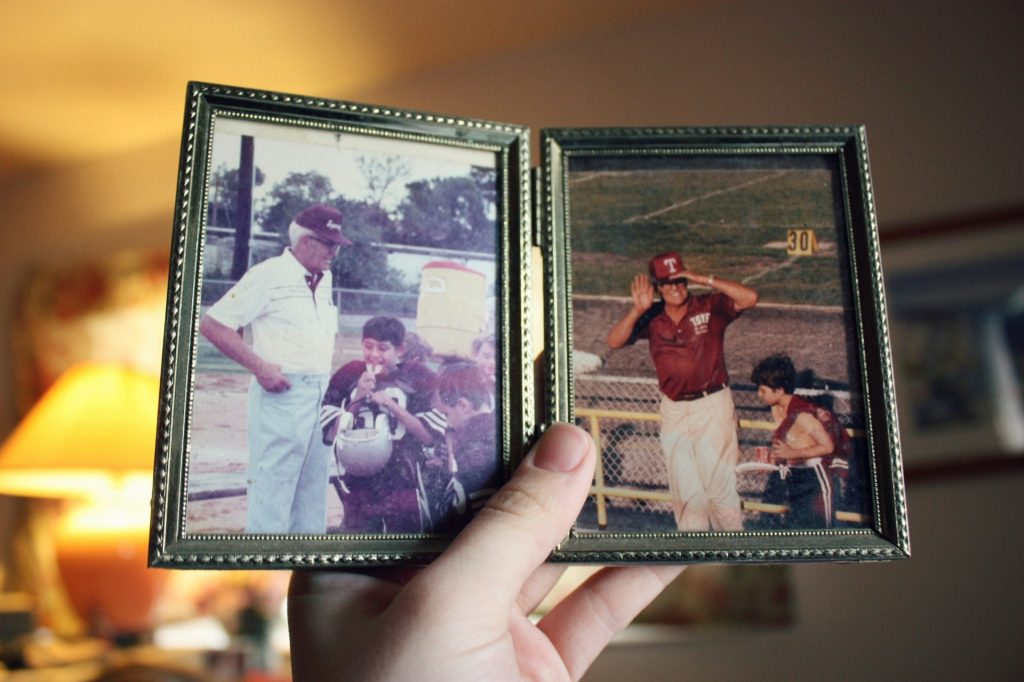 A photo frame showing old photos of a family.