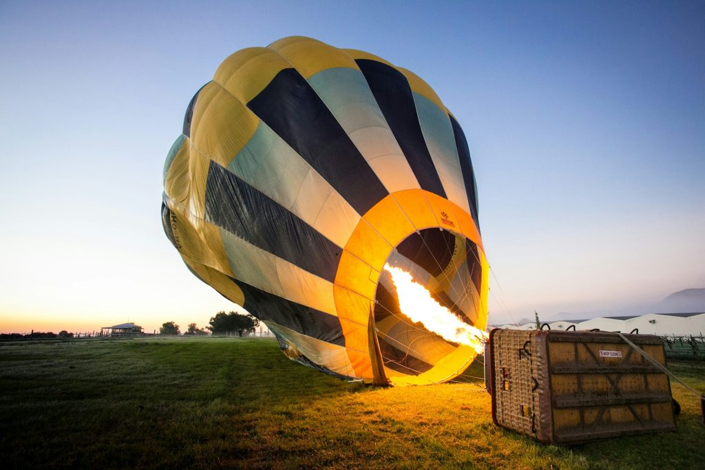 A hot air balloon being filled with air.