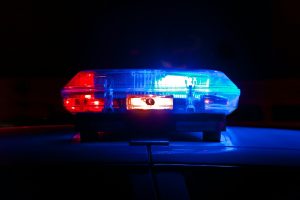 The red and blue light that sits atop a police car.