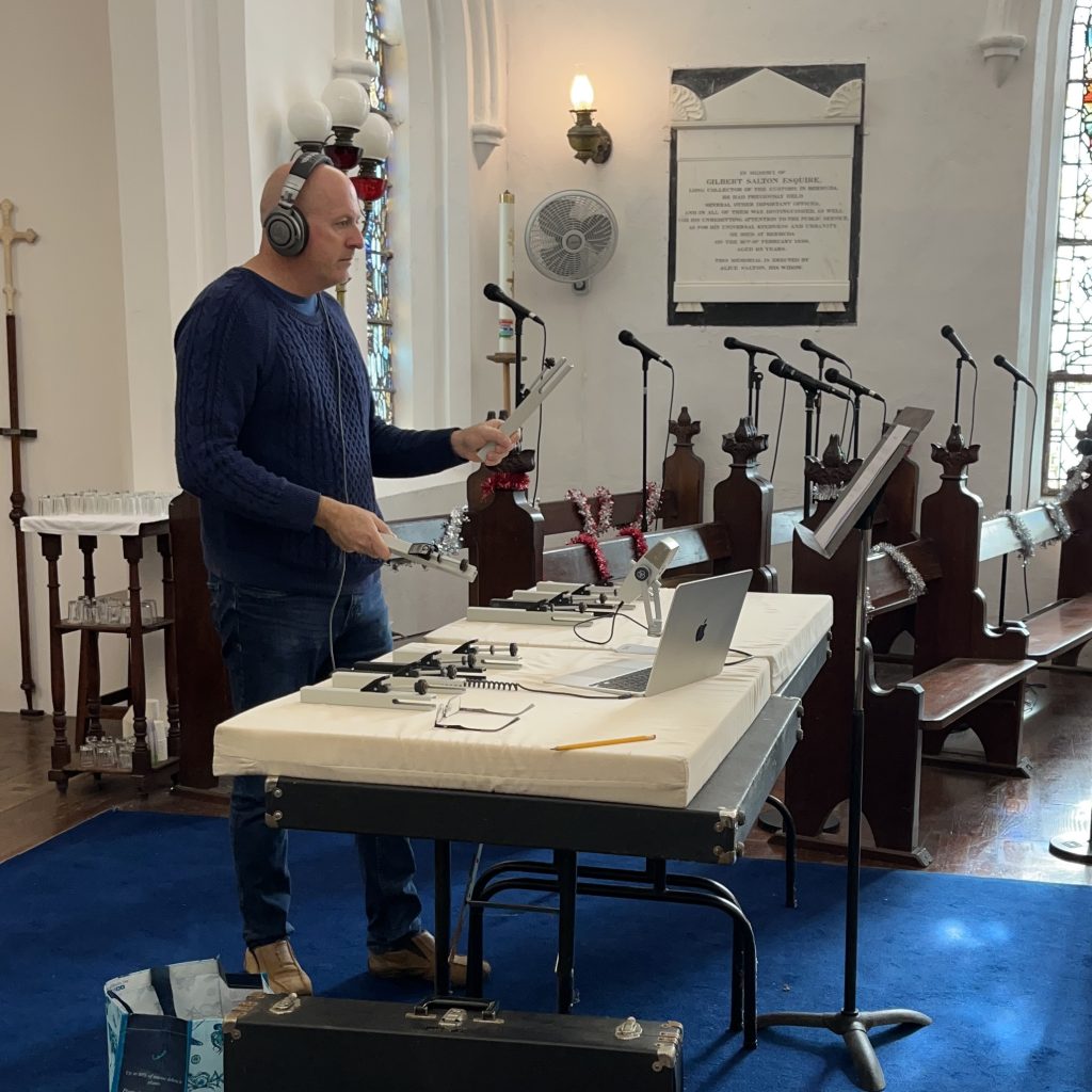 A photo of Rev Gav recording the St. Mark's Church chimes.