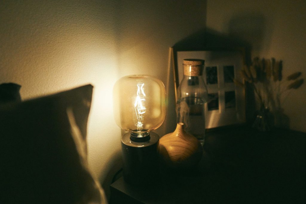 A bedside light on a nightstand.