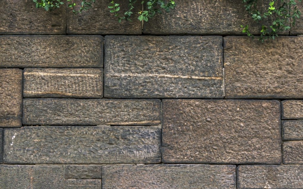 Large blocks of stone in a wall.